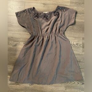 Tan dress with sequin decoration